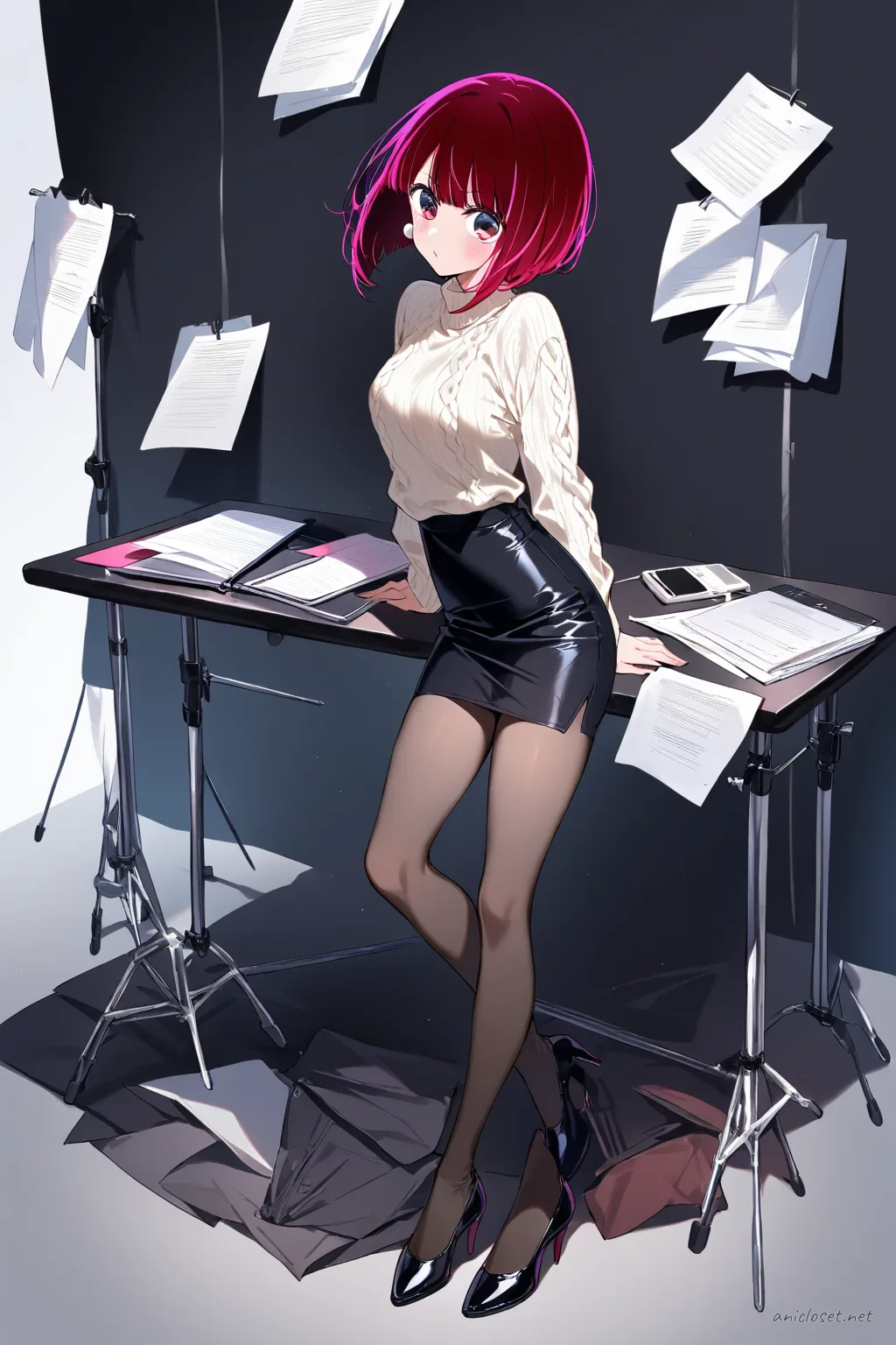 Kana Arima wearing a charcoal pencil skirt and fitted knit sweater, pearl earrings, black tights, and black heels, leaning on a desk with laptop and papers